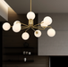 felton-9-light-pendant-antique-gold_